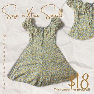 Tilly’s blue and orange daisy romper. Size XS.